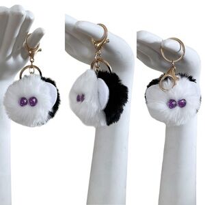 Black & White Character Fluffy Pom Pom Keychain Accessory with Purple Heart Eyes